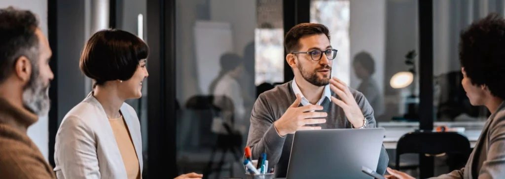 Team collaborating in a modern office meeting