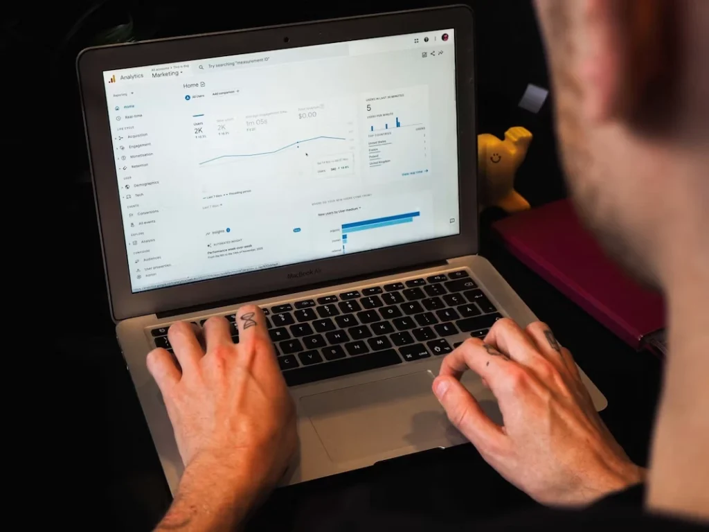 Person working on a web application on a laptop