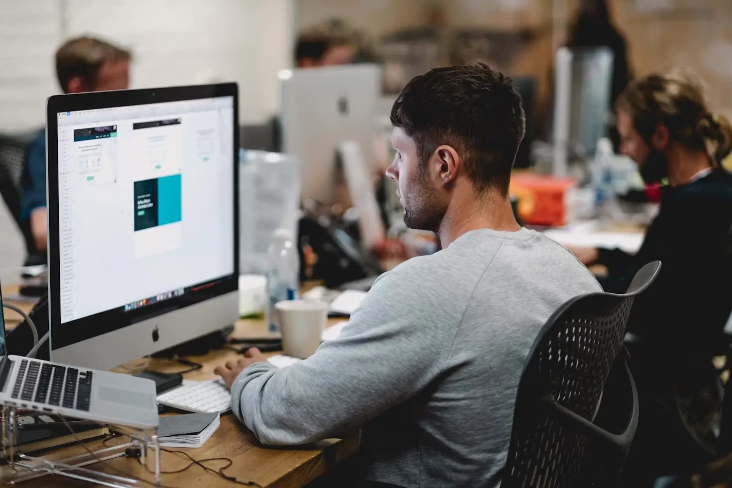 Developer working at a desktop computer