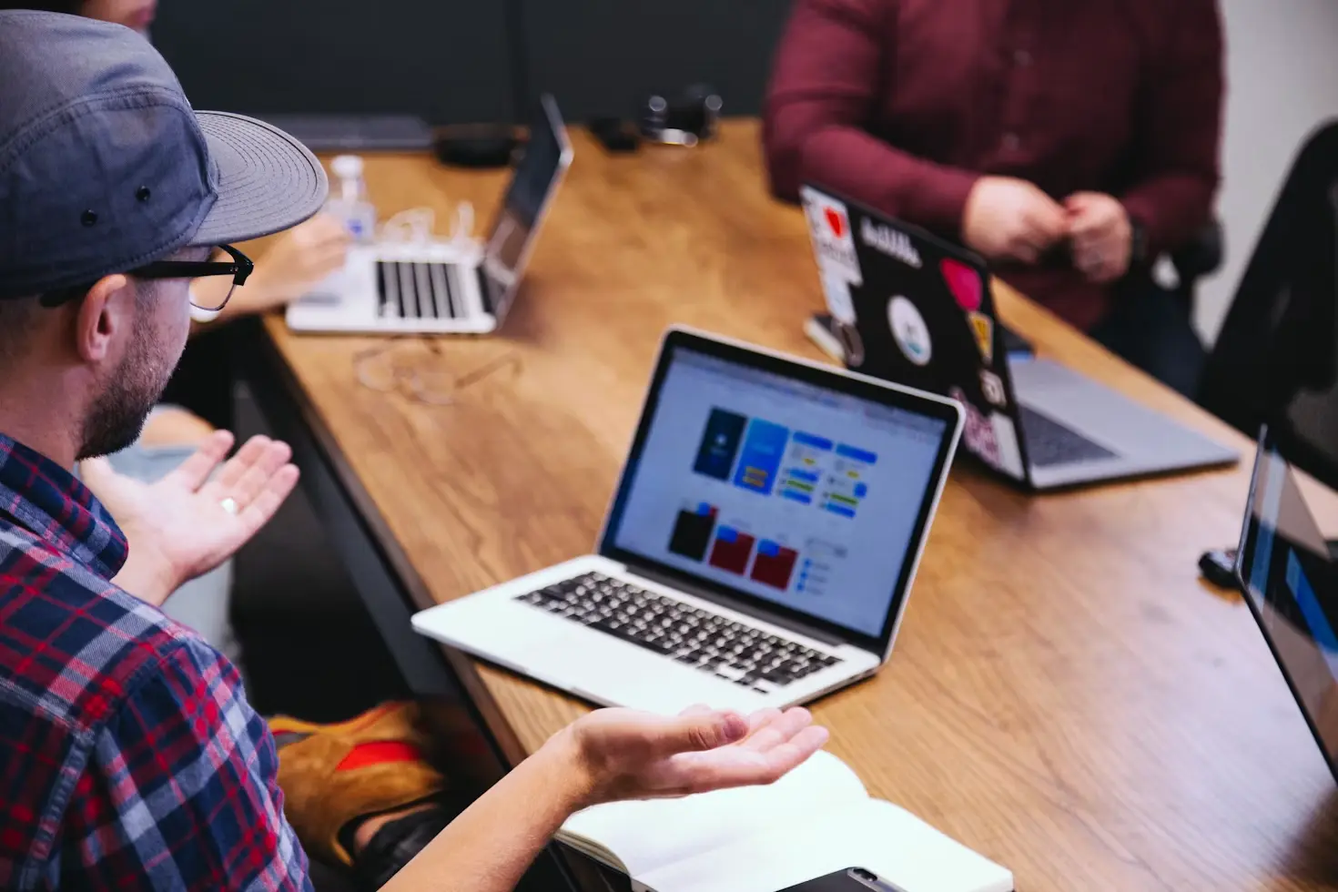 Team meeting with a laptop presentation