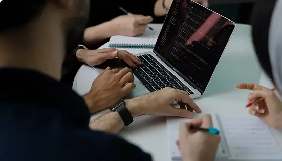 Team taking notes during a meeting