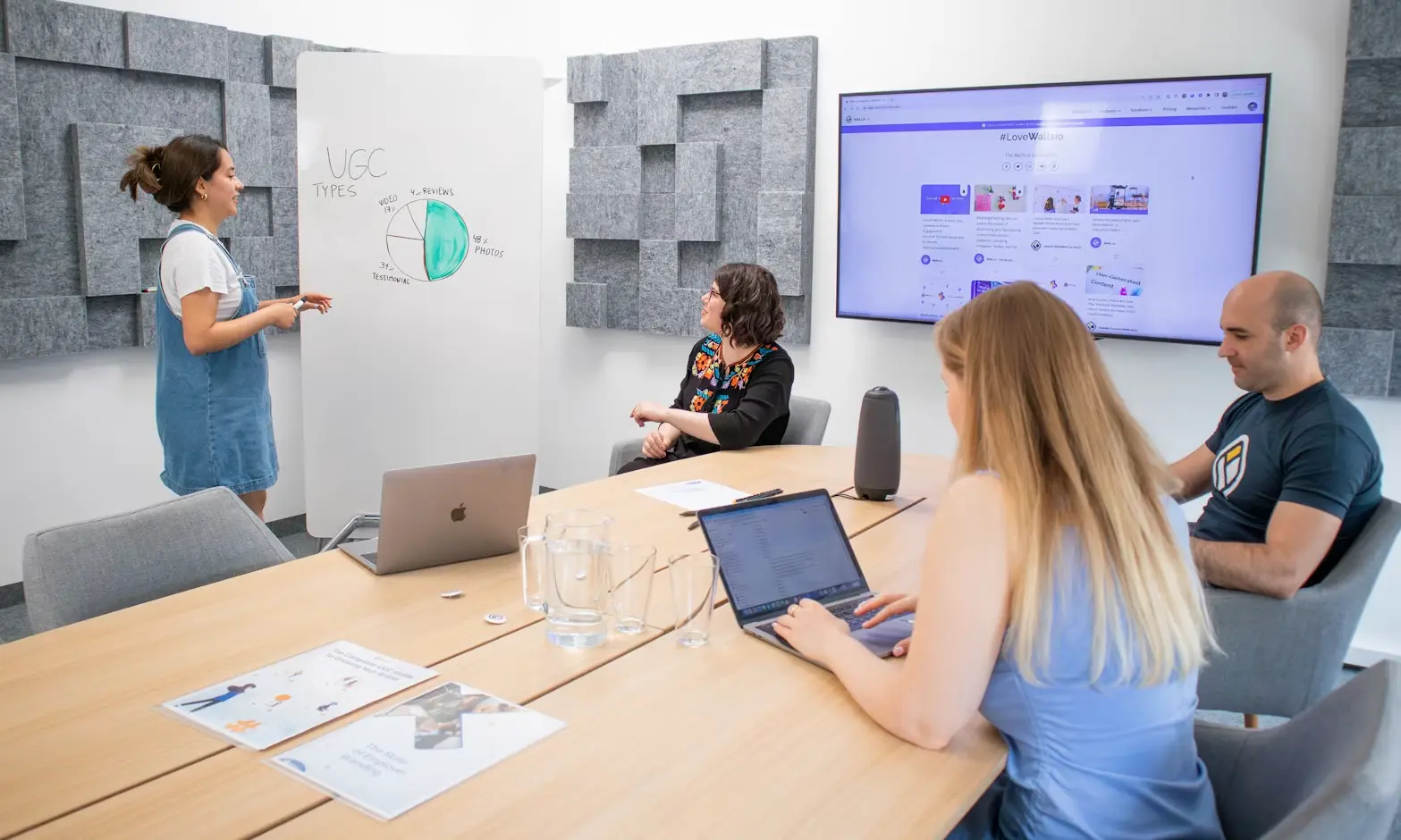 Team workshop with a presentation on screen